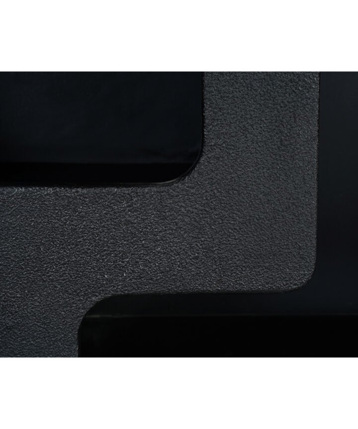 Close-up of a black textured metal frame from the Mia Modern Tall Geometric Bookcase, highlighting the curved corner and rugged surface details.